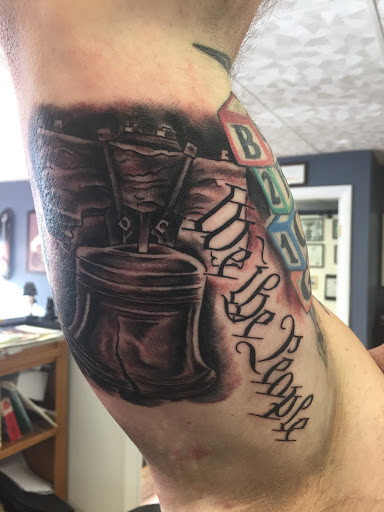 Explore stomach tattoo ideas female, creative tattoo ideas in Mchenry, available at Lunchbox Tattoo and Body Piercing