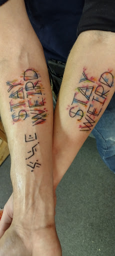 Explore bracelet tattoo ideas with names, creative tattoo ideas in Troy, available at InkSlingers Tattoo Shop