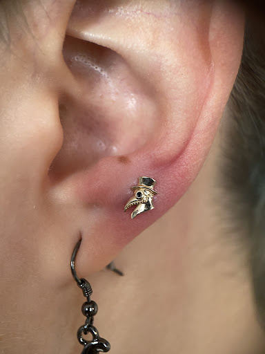 Explore hellscape battle sleeve tattoo ideas, creative tattoo ideas in North Tonawanda, available at Black Label Tattoo Club & Piercing