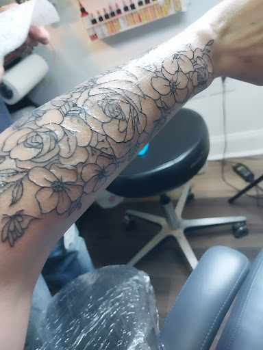 Explore large flower tattoo ideas, creative tattoo ideas in Cleveland, available at NBA tattoo