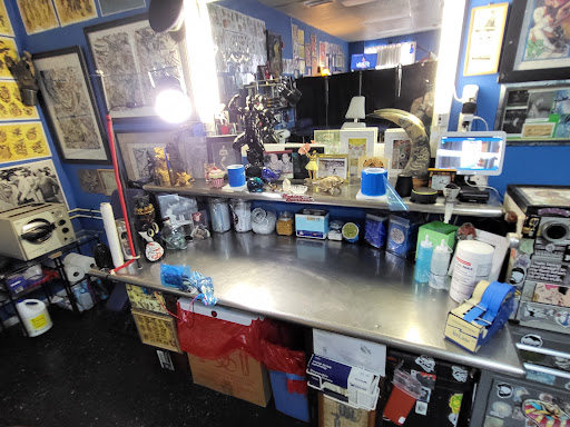 Explore university of michigan tattoo ideas, creative tattoo ideas in Englewood, available at The Original Big Daddy Tattoo & Body Piercing est.1997 est.1997