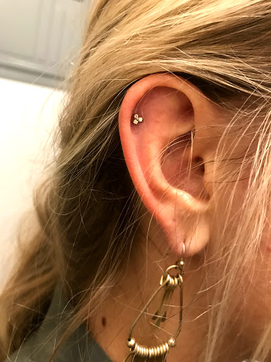 Explore cool hand tattoo ideas for guys, creative tattoo ideas in Vancouver, available at The Powers That Be Body Piercing