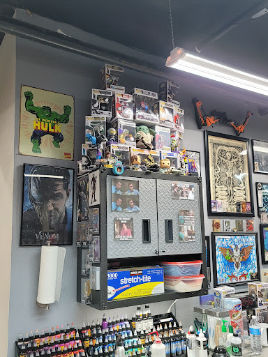 Explore emperor's new groove tattoo ideas, creative tattoo ideas in Reno, available at My Religion Tattoo - No Piercing