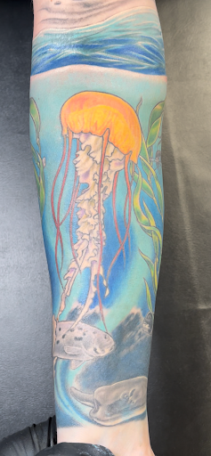 Explore belize tattoo ideas, creative tattoo ideas in Seaside, available at Creative Visions Ink Tattoo & Body Piercing Studio - Call for Appointment