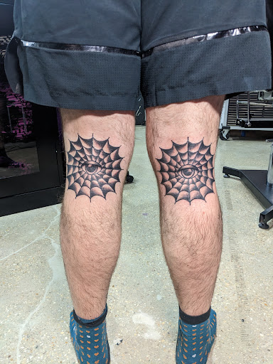 Explore rip neck tattoo ideas, creative tattoo ideas in Arlington, available at Lady Octopus Tattoos