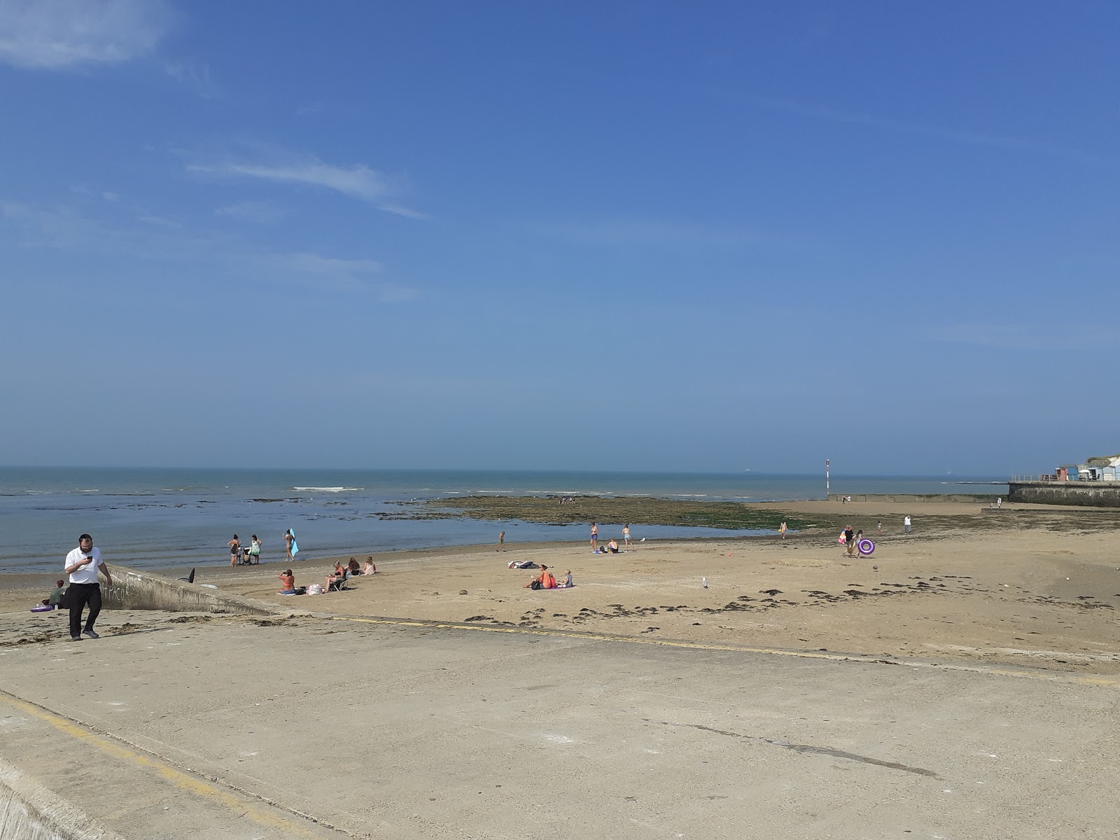 Photo of St. Mildred's Bay with blue pure water surface