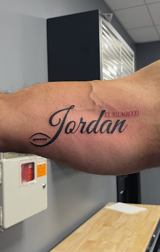 Explore men tattoo ideas leg, creative tattoo ideas in Roselle, available at Atmosphere Tattoo Gallery - Roselle