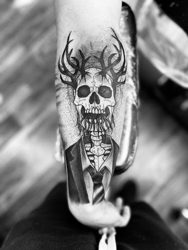 Explore may birth flower tattoo ideas, creative tattoo ideas in Huntington, available at Golden Dagger Tattoos and Piercings