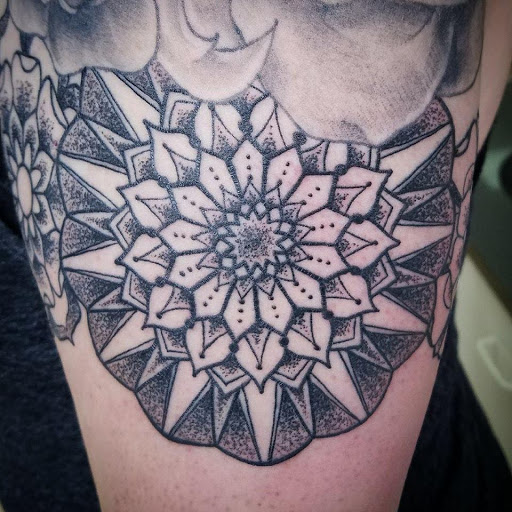 Explore thigh tattoos ideas for guys, creative tattoo ideas in Colorado Springs, available at West Side Tattoo
