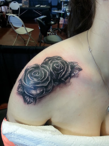 Explore realistic tattoo ideas, creative tattoo ideas in Spencer, available at Ink Envy Tattoo And Body Piercing