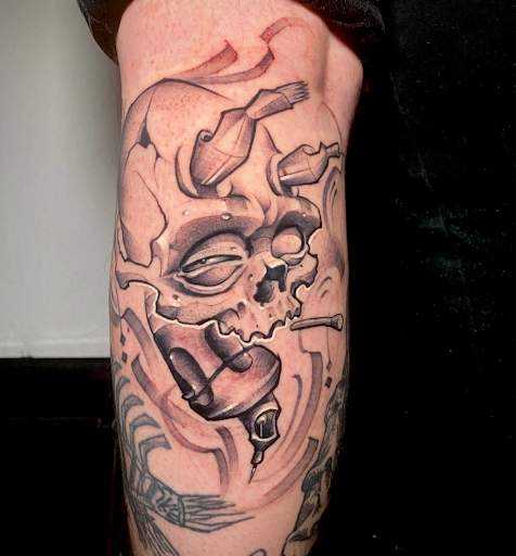 Explore cover up tattoo ideas for leg, creative tattoo ideas in Upland, available at Greaskull Tattoo Alley