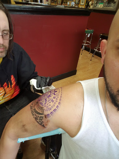 Explore the office tattoo ideas, creative tattoo ideas in Cheltenham, available at Louder Than Bombs Tattoo