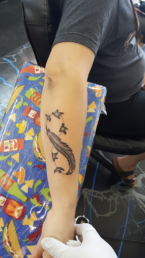 Explore asl tattoo ideas, creative tattoo ideas in Redding, available at Caddy Daddys