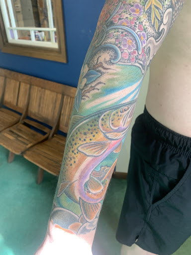 Explore lizard tattoo ideas, creative tattoo ideas in Boulder, available at Rising Tide Tattoo Emporium