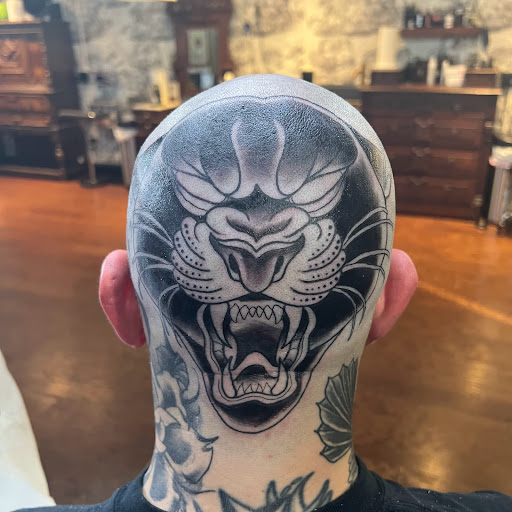Explore iron maiden tattoo ideas, creative tattoo ideas in Buffalo, available at True Gloom Tattoo Studio