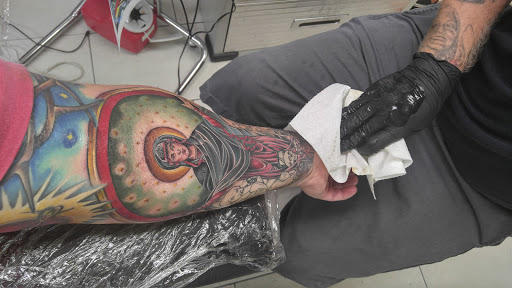 Explore cover up tattoo ideas for forearm, creative tattoo ideas in Saint Louis, available at Cousin Pauls Tattoo Co.