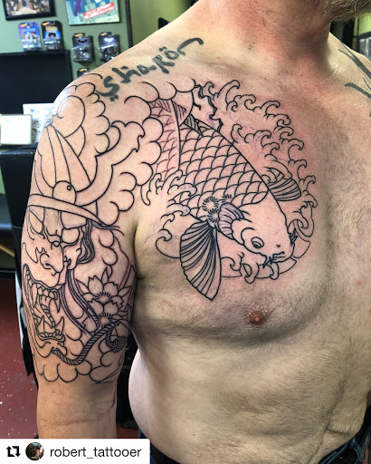 Explore flower arm sleeve tattoo ideas, creative tattoo ideas in Merced, available at Merced Tattoo and Piercing Co.