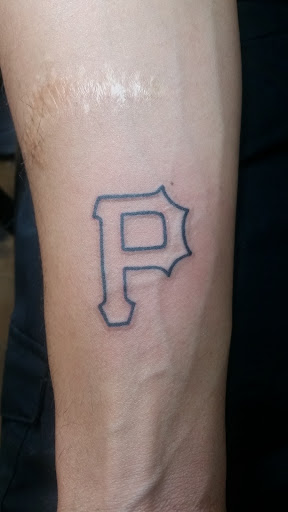 Find male tattoo ideas shoulder for your next unique tattoo in West Palm Beach at Ink Link Tattoos & Piercings