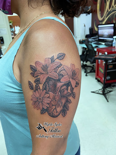 Explore new born tattoo ideas, creative tattoo ideas in San Diego, available at Wylde Sydes Tattoo & Body Piercing