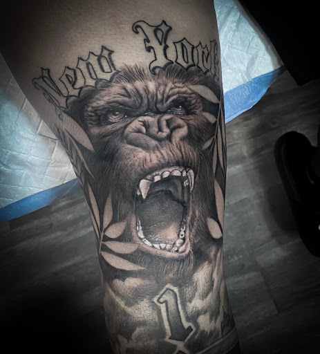 Explore female tattoo ideas for lower back, creative tattoo ideas in Goose Creek, available at Red Kirin Tattoo