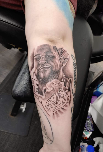Explore dripping tattoo ideas, creative tattoo ideas in Royston, available at Tasi Tattoo