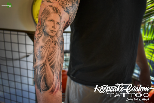 Explore dolphin tattoo ideas, creative tattoo ideas in Salisbury, available at Keepsake Custom Tattoo & Body Piercing Laser Tattoo Removal