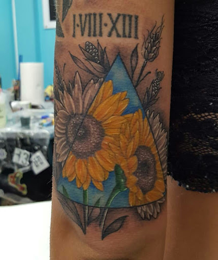 Explore king of hearts tattoo ideas, creative tattoo ideas in Wilmington, available at Trademark Tattoo