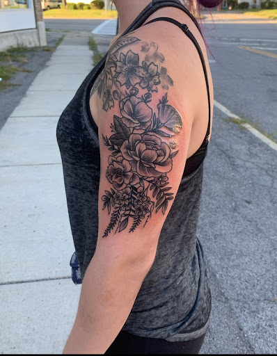 Explore women's back tattoo ideas, creative tattoo ideas in Batavia, available at Tried & True Tattoo