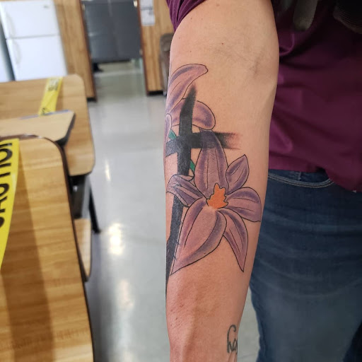 Explore bow hunting tattoo ideas, creative tattoo ideas in Forestville, available at RedSpaghetti Tattoo