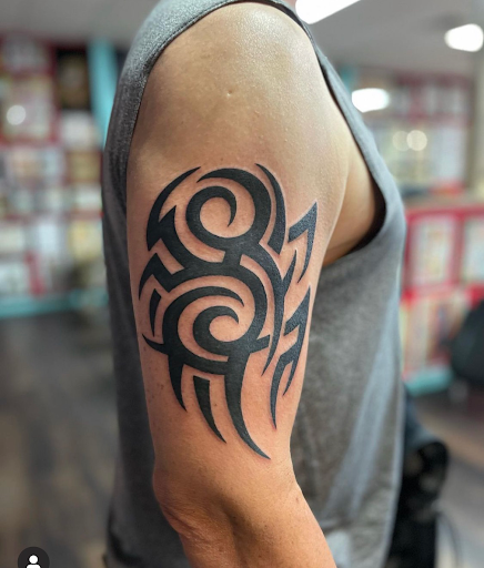 Explore jersey tattoo ideas, creative tattoo ideas in Georgetown, available at Iron Rite Tattoo South