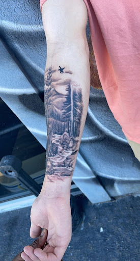 Explore mountain range tattoo ideas, creative tattoo ideas in Goose Creek, available at Red Kirin Tattoo