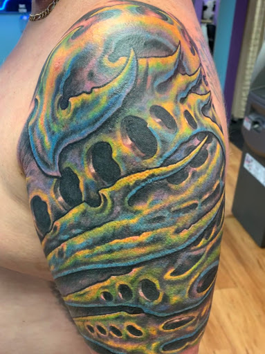 Explore mens side tattoo ideas, creative tattoo ideas in Clearwater, available at Kill em All Tattoo, LLC