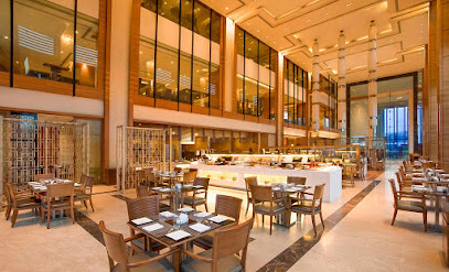 Momo Cafe - Courtyard By Marriott Satellite Road, Ramdev Nagar, Satellite, Ahmedabad, Gujarat 380015, India