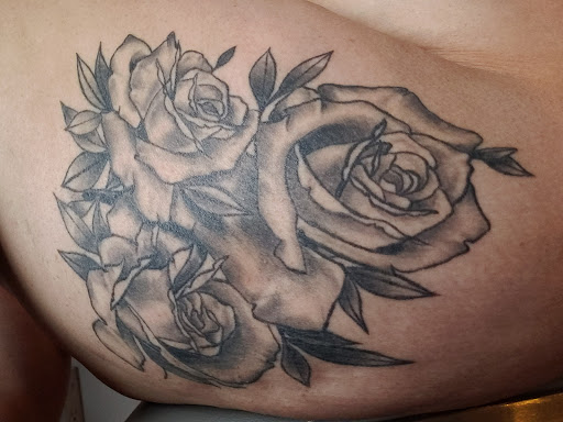 Explore stitches tattoo ideas, creative tattoo ideas in Milwaukee, available at Bay Street Tattoo Co.