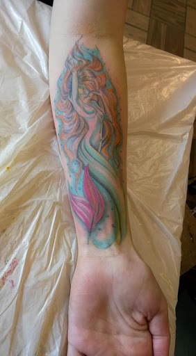Explore drumming tattoo ideas, creative tattoo ideas in Sigourney, available at Octopus Ink Professional Tattoo & Piercing