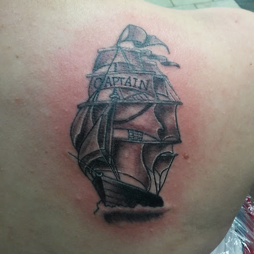 Tattoo Shop «Snake & Dagger Tattoo Company», reviews and photos, 5531 S Saginaw St, Grand Blanc, MI 48439, USA