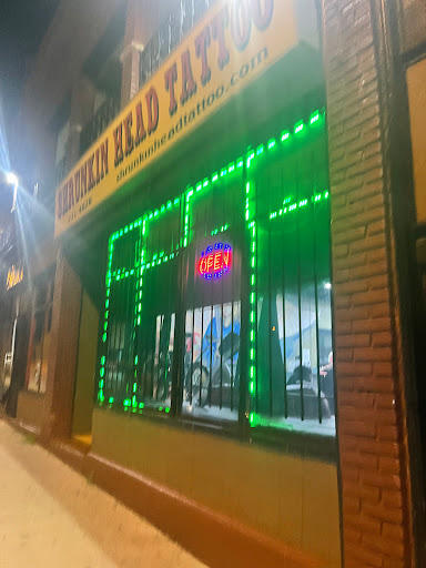 Tattoo Shop «Shrunkin Head Tattoo», reviews and photos, 4438 St John Ave, Kansas City, MO 64123, USA