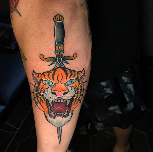 Find tattoo ideas for in between breast for your next unique tattoo in Odessa at Black Cat Tattoo Company