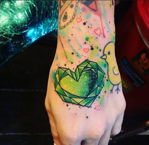 Explore small couples tattoo ideas, creative tattoo ideas in Benton, available at Spectrum Tattoo