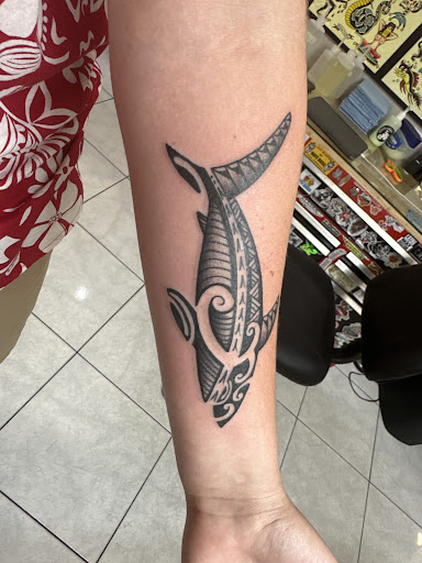 Explore clown tattoo ideas, creative tattoo ideas in Honolulu, available at Sacred Art Tattoo Waikiki