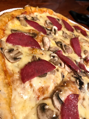 Rollos y Pizza - Pizzeria