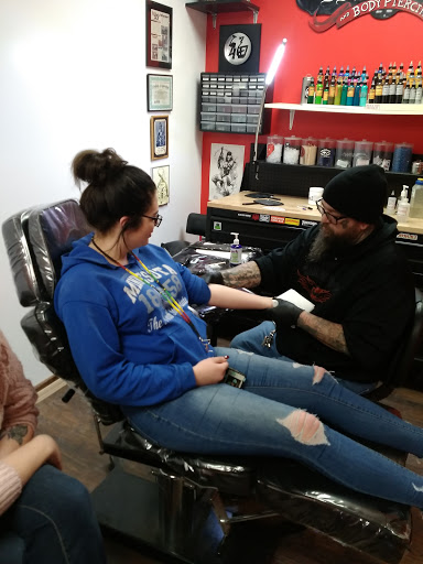 Explore male inner bicep tattoo ideas, creative tattoo ideas in Willmar, available at Relentless Ink Studio