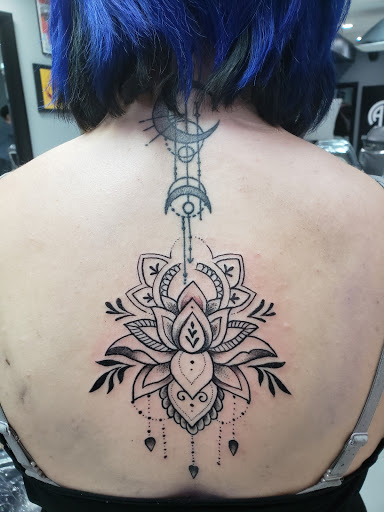 Explore cute frog tattoo ideas, creative tattoo ideas in Schaumburg, available at Atmosphere Tattoo Gallery - Schaumburg