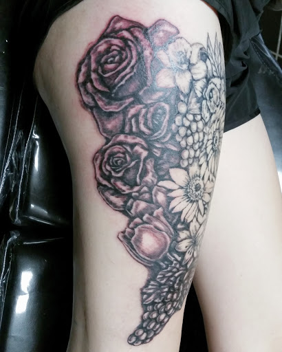 Explore koi fish tattoo sleeve ideas, creative tattoo ideas in Erie, available at EliKingInk