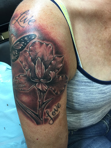 Explore surfing tattoo ideas, creative tattoo ideas in Salina, available at Supercharged Tattoo