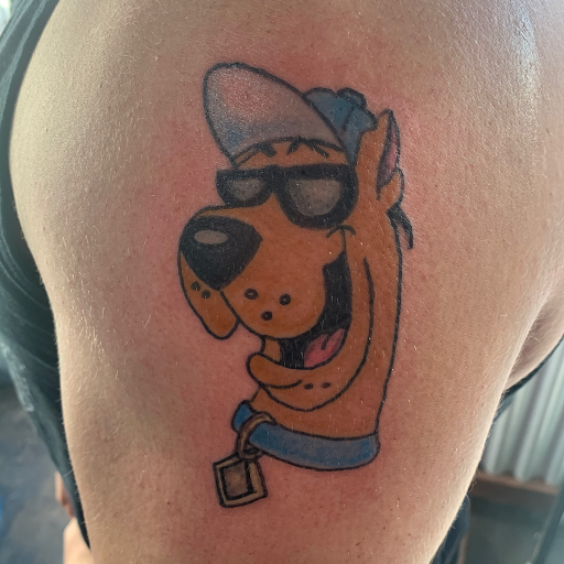 Explore music lover tattoo ideas, creative tattoo ideas in Denison, available at Crossroads Tattoo Studio