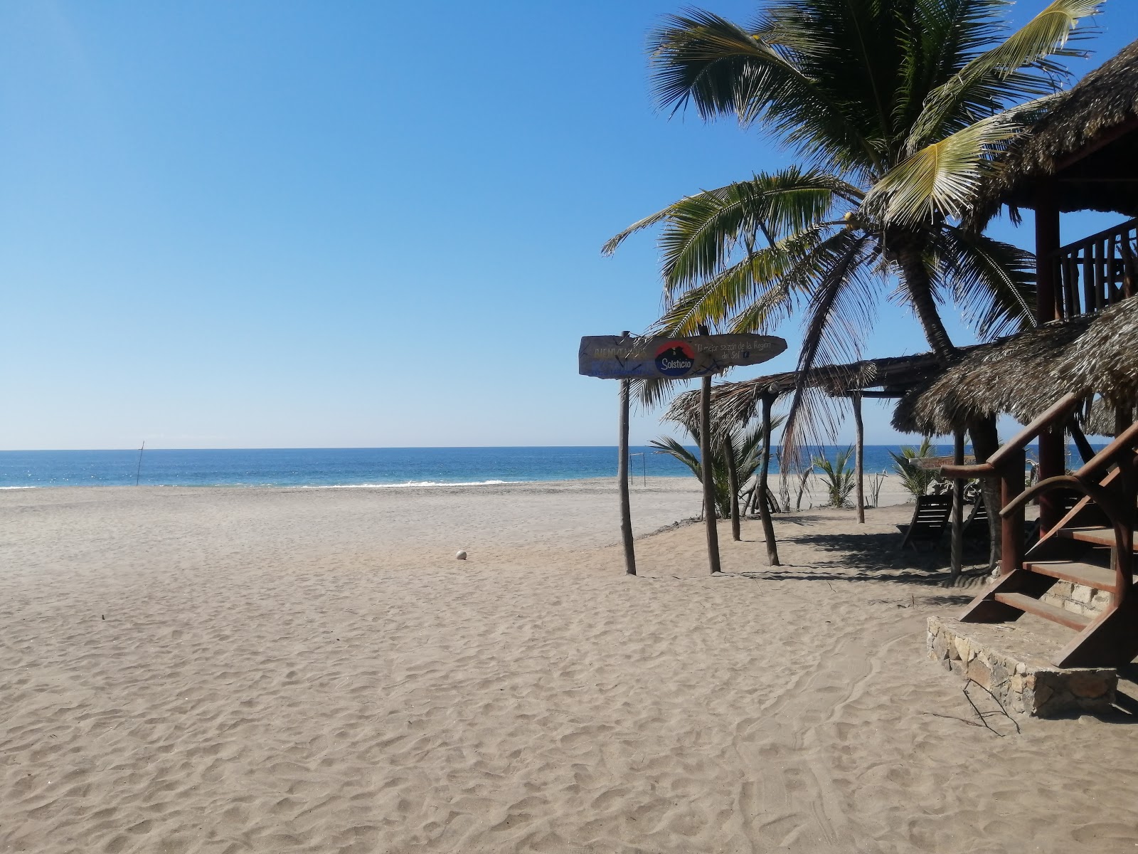 Foto av Playa La Ventanilla med turkosa vatten yta