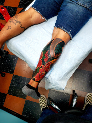 Explore boxer dog tattoo ideas, creative tattoo ideas in Fall River, available at Fall River Tattoo Co