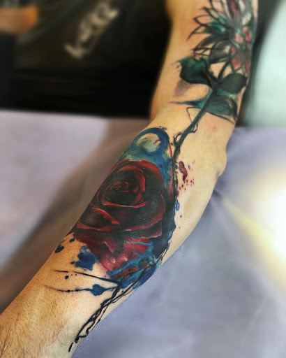 Explore forearm flower tattoo ideas, creative tattoo ideas in Stowe, available at World Famous Monkey House Customs