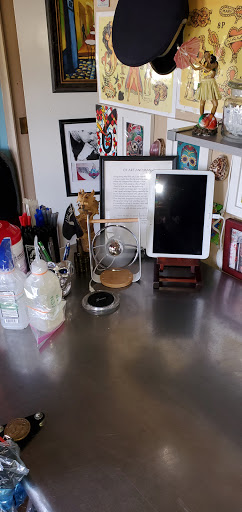 Explore lost love tattoo ideas, creative tattoo ideas in Englewood, available at The Original Big Daddy Tattoo & Body Piercing est.1997 est.1997